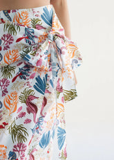 A Model Wearing White Organic Cotton Blooming Reef Cotton White Wrap Skirt, curated by Only Ethikal